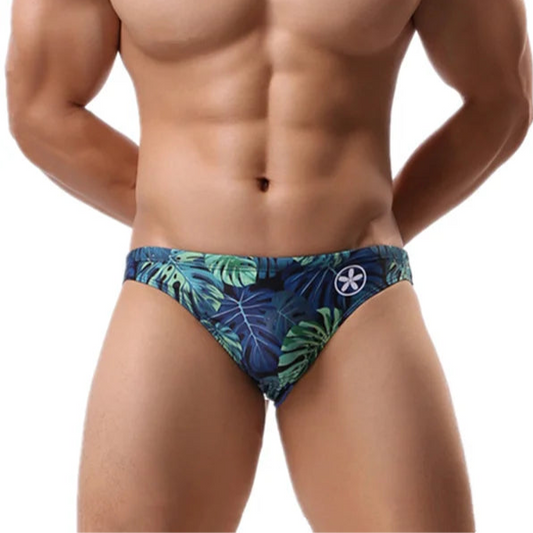 a sexy man in Men’s Waverider Jungle Low Rise Bikini Swim Briefs - pridevoyageshop.com - gay men’s sexy swim briefs, trunks, board shorts, and bikinis