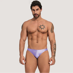 a sexy man in Pastel Lilac Men’s Shiny Lube Job Mini Swim Briefs - pridevoyageshop.com - gay men’s sexy swim briefs, trunks, board shorts, and bikinis