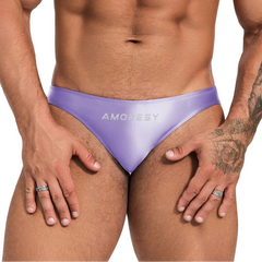a sexy man in Pastel Lilac Men’s Shiny Lube Job Mini Swim Briefs - pridevoyageshop.com - gay men’s sexy swim briefs, trunks, board shorts, and bikinis