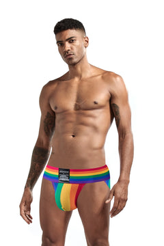 a sexy man in Rainbow Pride Flash Bikini Brief - pridevoyageshop.com - gay men's underwear, Pride rainbow bikini