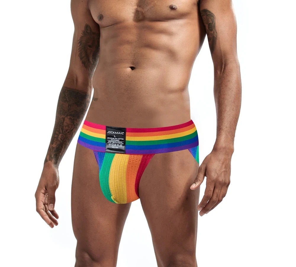 a sexy man in Rainbow Pride Flash Bikini Brief - pridevoyageshop.com - gay men's underwear, Pride rainbow bikini