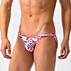 a sexy man in Signal Flags Men’s Red Light Marina Mesh Bikini Swim Briefs - pridevoyageshop.com - gay men’s sexy swim briefs, trunks, board shorts, and bikinis