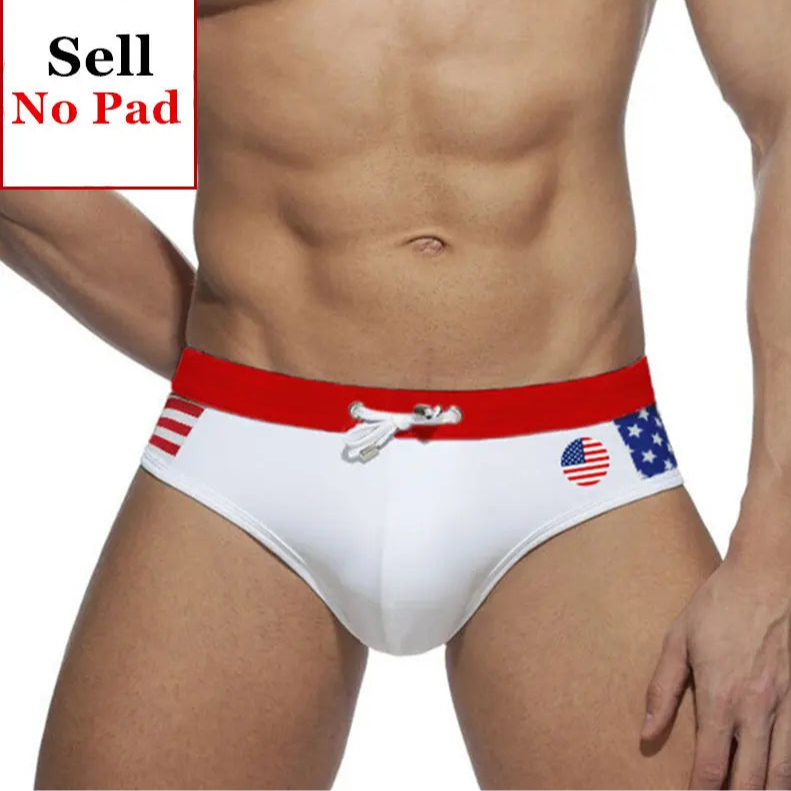 a sexy man in USA flag Men’s World Play National Flags Swim Briefs - pridevoyageshop.com - gay men’s sexy swim briefs, trunks, board shorts, and bikinis