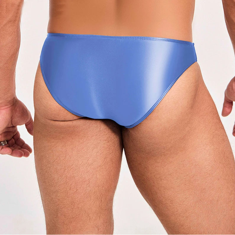 a sexy man in Very Peri Men’s Shiny Lube Job Mini Swim Briefs - pridevoyageshop.com - gay men’s sexy swim briefs, trunks, board shorts, and bikinis