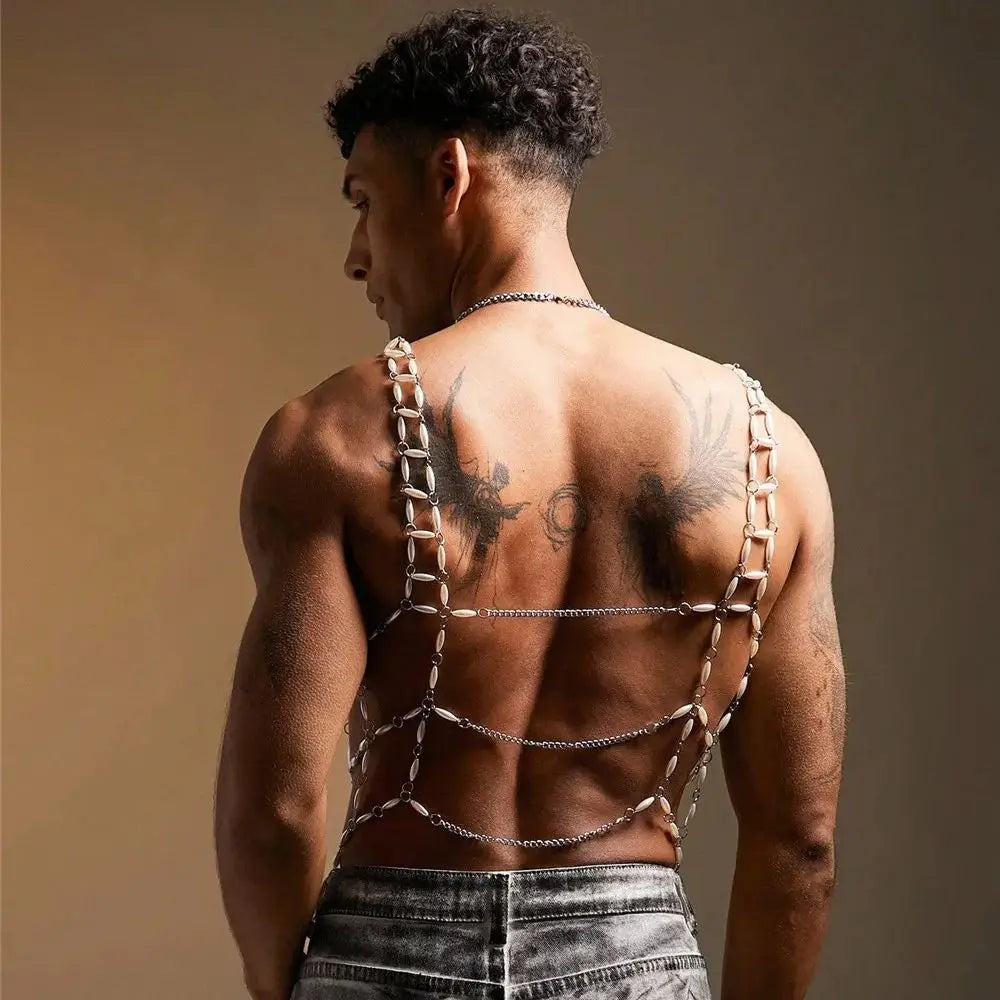 a sexy man in White Oyster Boy Fantasy Rhinestone Mesh Vest - pridevoyageshop.com - gay men's harness, fetish gear, rave outfit
