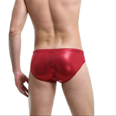 a sexy man in a sexy man in red Men’s Slay the Shine Shiny Swim Briefs - pridevoyageshop.com - gay men’s sexy swim briefs, trunks, board shorts, and bikinis