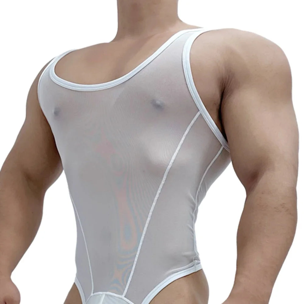 a sexy man in a white sheer mesh leotard highlighting chest and abs through see-through fabric – pridevoyageshop.com – gay men’s harness, lingerie and fetish wear