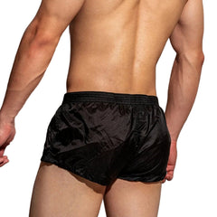 a sexy man in black DM Men’s Airdrop Low-Rise Sheer Boxers – pridevoyageshop.com – gay men’s sexy swim briefs, trunks, board shorts, and bikinis
