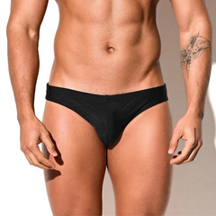 a sexy man in black Desmiit Men’s Trophy Cut Swim Briefs - pridevoyageshop.com - gay men’s sexy swim briefs, trunks, board shorts, and bikinis