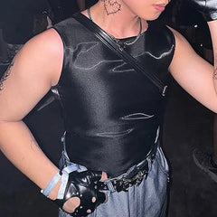 a sexy man in black Follow Me Home Lace-Up Club Vest – pridevoyageshop.com – gay men’s harness, lingerie and fetish wear