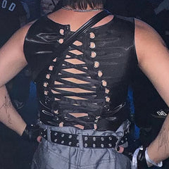 a sexy man in black Follow Me Home Lace-Up Club Vest – pridevoyageshop.com – gay men’s harness, lingerie and fetish wear