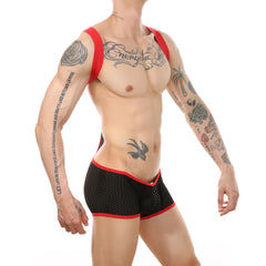 a sexy man in black Hookup Mesh Harness Singlet – pridevoyageshop.com – gay men’s harness, lingerie and fetish wear