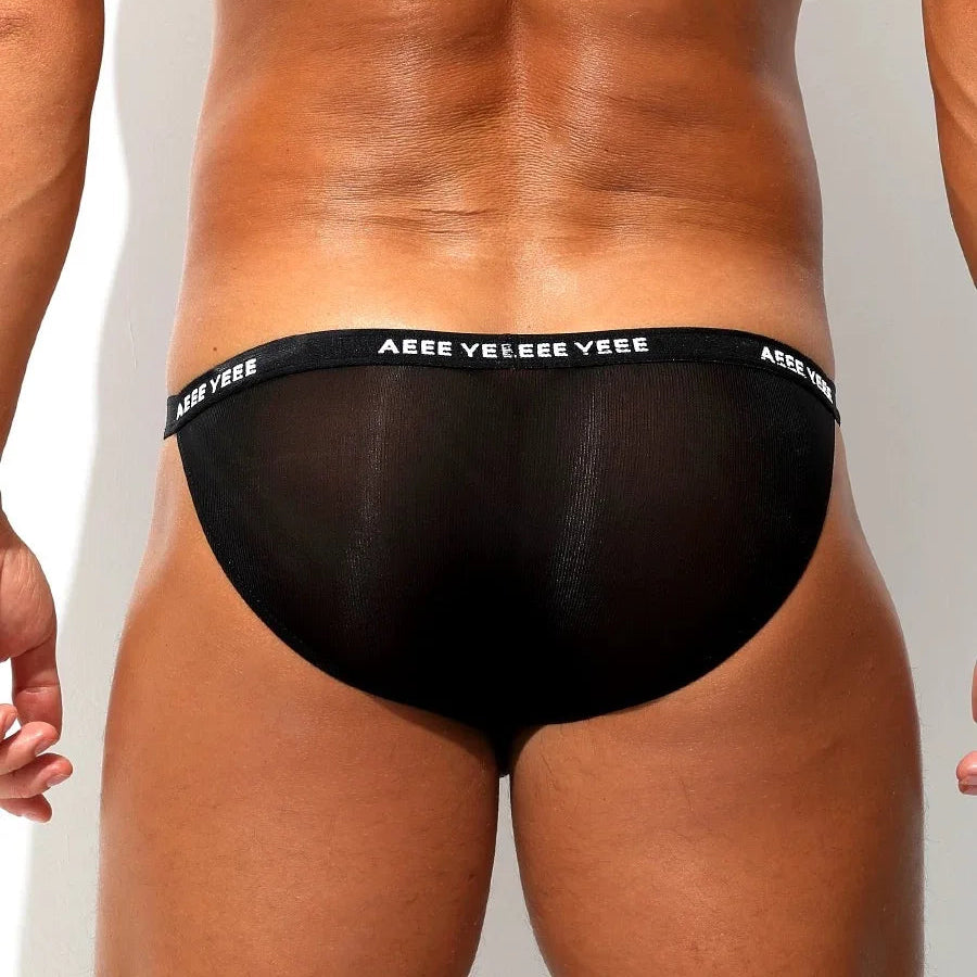 a sexy man in black Men’s AEEE YEEE Peek-a-Boo Brief - pridevoyageshop.com - gay men’s thongs, boxers, briefs and jockstraps