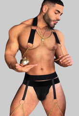 a sexy man in black Men’s After Dark Gold-Chain Harness & Garter Set – pridevoyageshop.com – gay men’s harness, lingerie and fetish wear
