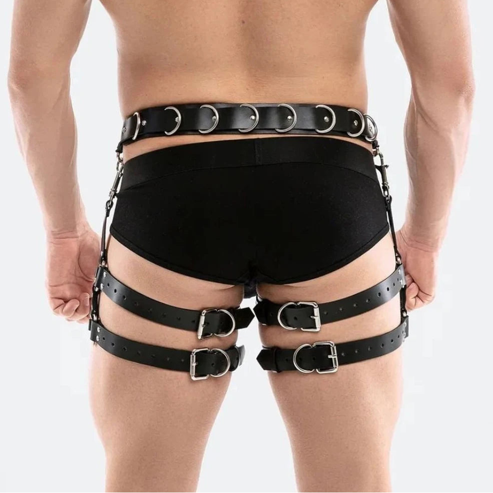 a sexy man in black Men’s Assignment Garter Harness – pridevoyageshop.com – gay men’s harness, lingerie and fetish wear