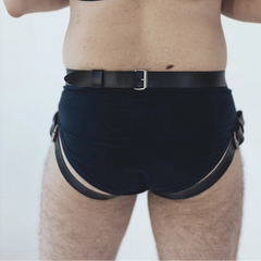 a sexy man in black Men’s Axis Jock Harness – pridevoyageshop.com – gay men’s harness, lingerie and fetish wear