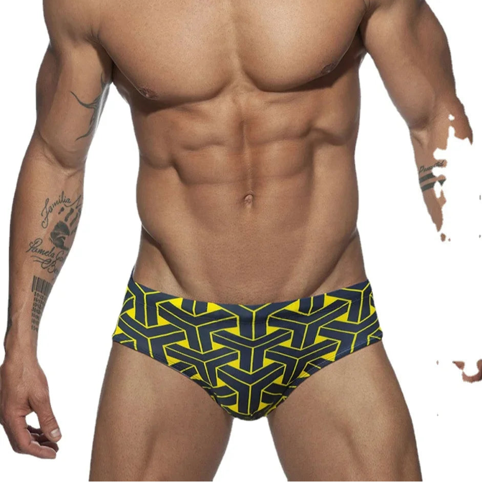 a sexy man in black Men’s Brickhouse Booty Swim Briefs - pridevoyageshop.com - gay men’s sexy swim briefs, trunks, board shorts, and bikinis