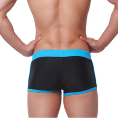 a sexy man in black Men’s Circuit Beat Low Rise Swim Trunks - pridevoyageshop.com - gay men’s sexy swim briefs, trunks, board shorts, and bikinis