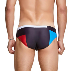 a sexy man in black Men’s Colorblock Bait Swim Briefs - pridevoyageshop.com - gay men’s sexy swim briefs, trunks, board shorts, and bikinis