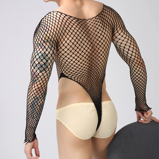 a sexy man in black Men’s Ensnare Fishnet Thong Bodysuit – pridevoyageshop.com – gay men’s harness, lingerie and fetish wear