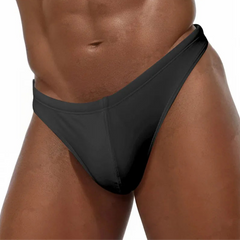 a sexy man in black Men’s Folsom Flash Micro Swim Bikini Thong – pridevoyageshop.com – gay men’s sexy swim briefs, trunks, board shorts, and bikinis