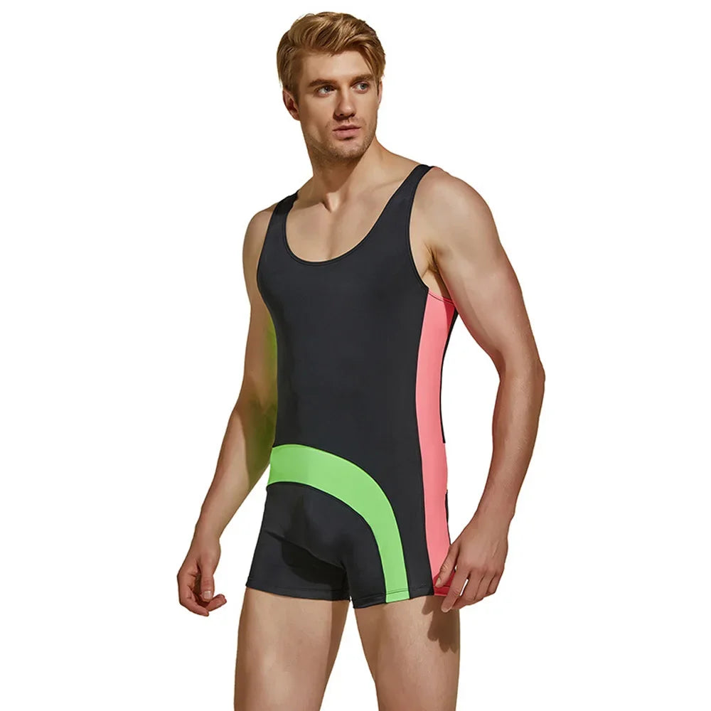 a sexy man in black Men’s Kinetic Curve Singlet – pridevoyageshop.com – gay men’s harness, lingerie and fetish wear