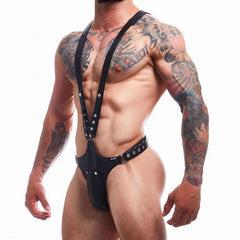 a sexy man in black Men’s Lockdown Suspender Jock Singlet – pridevoyageshop.com – gay men’s harness, lingerie and fetish wear