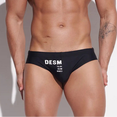 a sexy man in black Men’s MVP Meatpack Swim Briefs - pridevoyageshop.com - gay men’s sexy swim briefs, trunks, board shorts, and bikinis