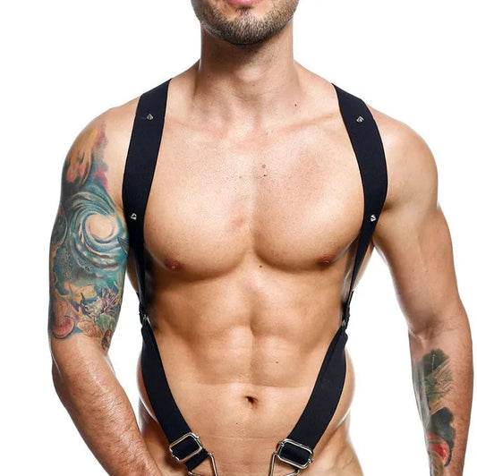 a sexy man in black Men’s Menace Spiked Harness – pridevoyageshop.com – gay men’s harness, lingerie and fetish wear