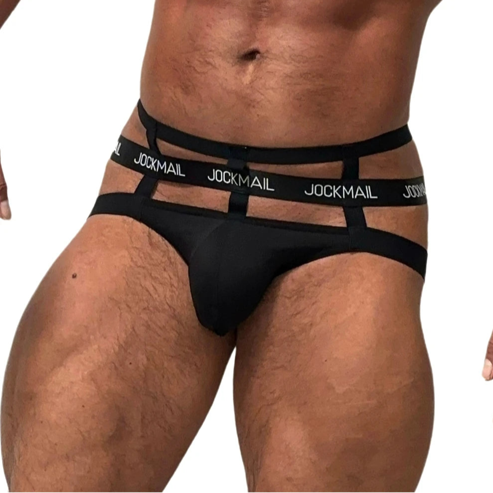 a sexy man in black Men’s Multi-Strap Cage Bare Thongs - pridevoyageshop.com - gay men’s thongs, boxers, briefs and jockstraps