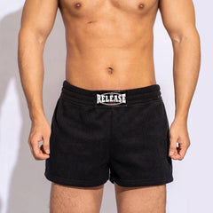 a sexy man in black Men’s Night Shift Fleece Lounge Shorts – pridevoyageshop.com – gay men’s sexy swim briefs, trunks, board shorts, and bikinis