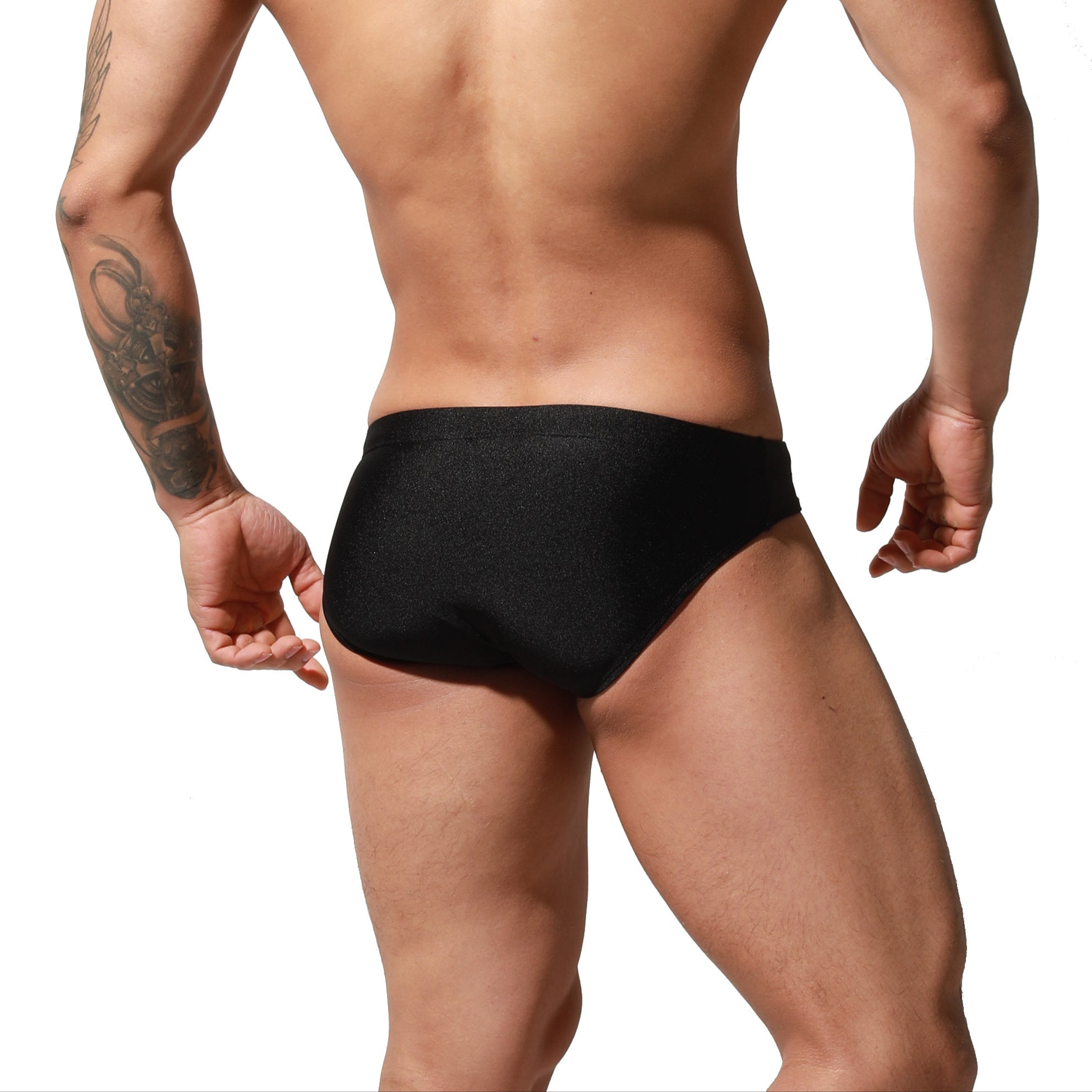 a sexy man in black Men’s Officer on Duty Low Rise Swim Briefs - pridevoyageshop.com - gay men’s sexy swim briefs, trunks, board shorts, and bikinis