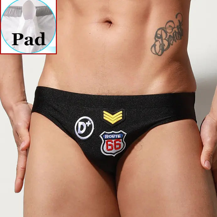 a sexy man in black Men’s Officer on Duty Low Rise Swim Briefs with pad - pridevoyageshop.com - gay men’s sexy swim briefs, trunks, board shorts, and bikinis