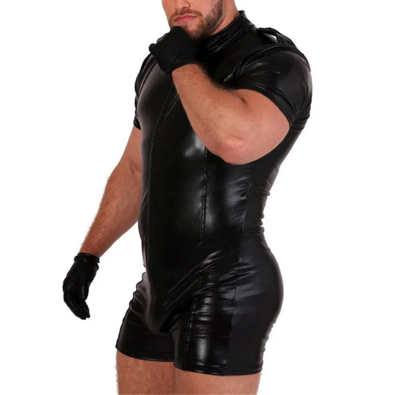a sexy man in black Men’s On Duty PU Leather Playsuit – pridevoyageshop.com – gay men’s harness, lingerie and fetish wear