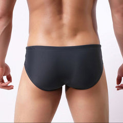 a sexy man in black Men’s Package Patrol Swim Briefs - pridevoyageshop.com - gay men’s sexy swim briefs, trunks, board shorts, and bikinis