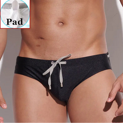 a sexy man in black Men’s Poolside Power Bottom Swim Briefs with pad - pridevoyageshop.com - gay men’s sexy swim briefs, trunks, board shorts, and bikinis