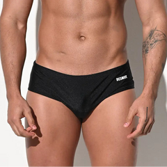 a sexy man in black Men’s Pouch Devil Low Rise Swim Briefs - pridevoyageshop.com - gay men’s sexy swim briefs, trunks, board shorts, and bikinis