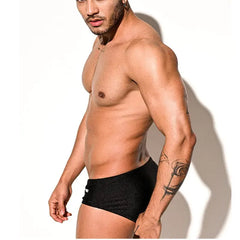 a sexy man in black Men’s Pouch Devil Low Rise Swim Briefs - pridevoyageshop.com - gay men’s sexy swim briefs, trunks, board shorts, and bikinis