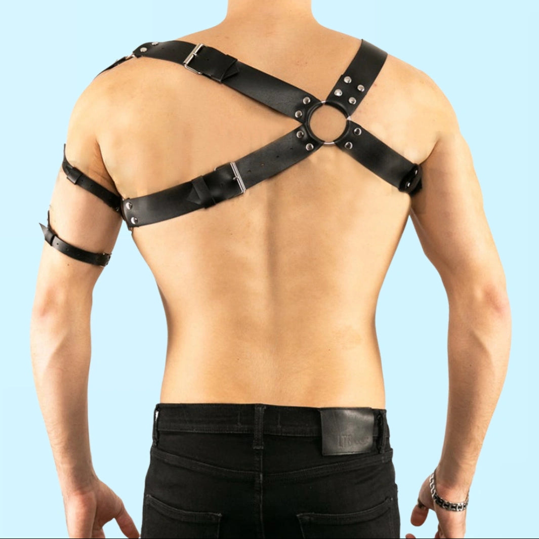 a sexy man in black Men’s Praetorian Gladiator Harness – pridevoyageshop.com – gay men’s harness, lingerie and fetish wear
