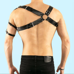 a sexy man in black Men’s Praetorian Gladiator Harness – pridevoyageshop.com – gay men’s harness, lingerie and fetish wear