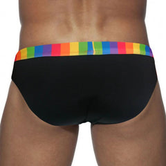 a sexy man in black Men’s Pride Patrol Rainbow Band Swim Briefs - pridevoyageshop.com - gay men’s sexy swim briefs, trunks, board shorts, and bikinis