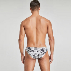 a sexy man in black Men’s Prism Tease Swim Briefs - pridevoyageshop.com - gay men’s sexy swim briefs, trunks, board shorts, and bikinis