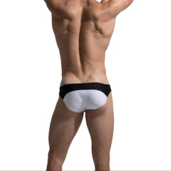 a sexy man in black Men’s Rival Jockline Bikini Swim Briefs - pridevoyageshop.com - gay men’s sexy swim briefs, trunks, board shorts, and bikinis