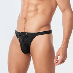 a sexy man in black Men’s Show Pony Drawstring Swim Briefs - pridevoyageshop.com - gay men’s sexy swim briefs, trunks, board shorts, and bikinis