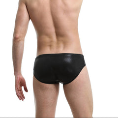 a sexy man in black Men’s Slay the Shine Shiny Swim Briefs - pridevoyageshop.com - gay men’s sexy swim briefs, trunks, board shorts, and bikinis