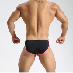 a sexy man in black Men’s Slick Split-Panel Swim Briefs - pridevoyageshop.com - gay men’s sexy swim briefs, trunks, board shorts, and bikinis