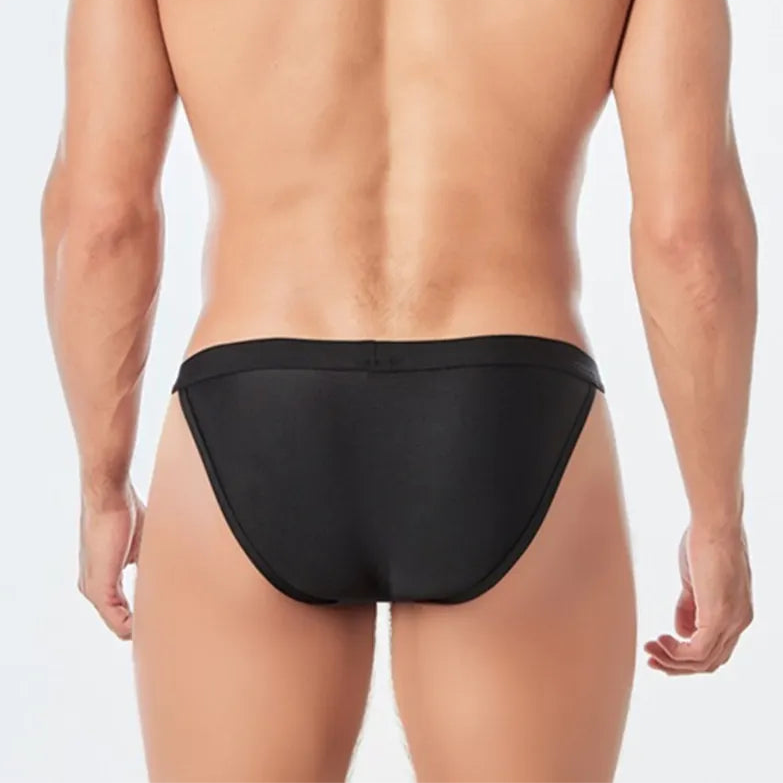 a sexy man in black Men’s Thigh High Rider Swim Briefs - pridevoyageshop.com - gay men’s sexy swim briefs, trunks, board shorts, and bikinis