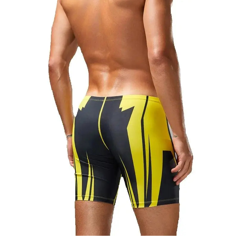 a sexy man in black Men’s Volt Strike Vortex Compression Swim Shorts – pridevoyageshop.com – gay men’s sexy swim briefs, trunks, board shorts, and bikinis