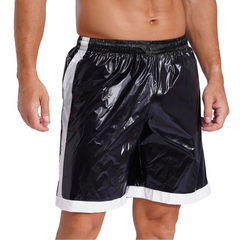 a sexy man in black Men’s Wet Look Lights Out Shorts – pridevoyageshop.com – gay men’s sexy swim briefs, trunks, board shorts, and bikinis