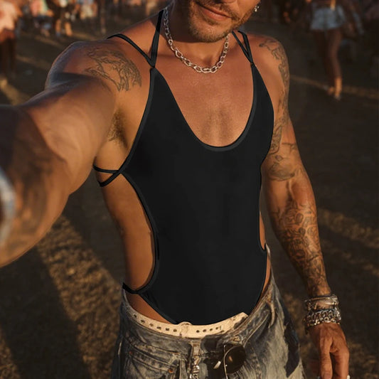 a sexy man in black Night Shift Keyhole Halter Bodysuit with a keyhole chest cut-out and high-cut fit, hugging his body and showing sculpted torso – pridevoyageshop.com – gay men’s harness, lingerie and fetish wear